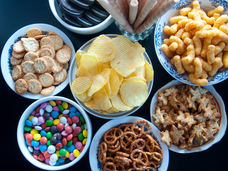 Processed food is real food that has been deprived of essential nutrients, such as fiber and vitamins. What remains are sugars and additives that, while extending their shelf life and making them addictive, ultimately contribute to increased cravings.